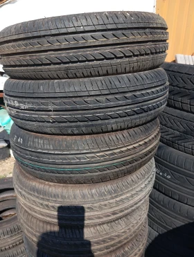 Гуми Всесезонни 185/60R14, снимка 3 - Гуми и джанти - 49512041