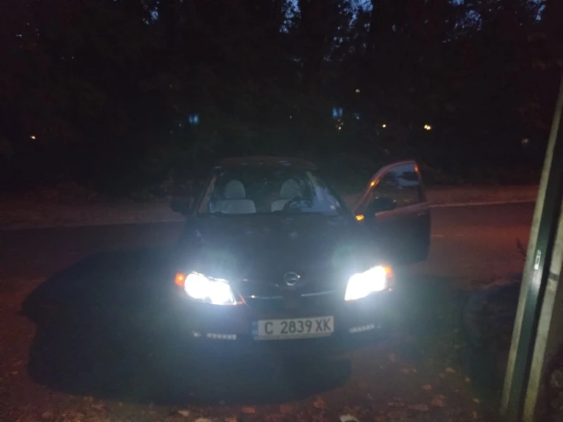 Nissan Almera N16, снимка 5 - Автомобили и джипове - 52318693