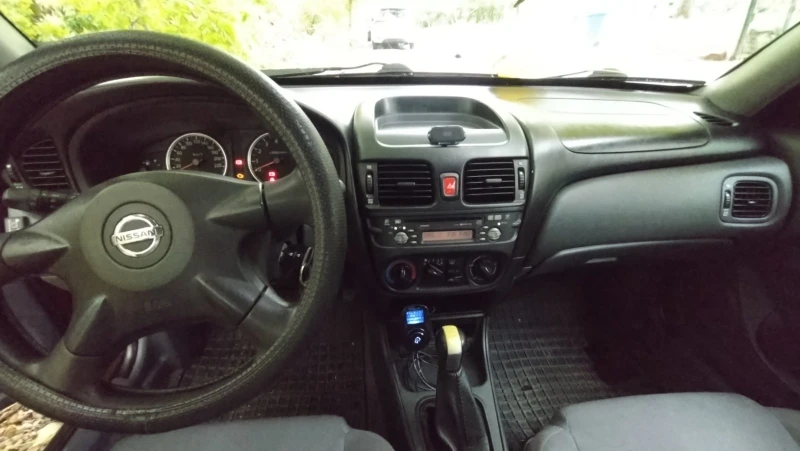 Nissan Almera N16, снимка 9 - Автомобили и джипове - 52318693
