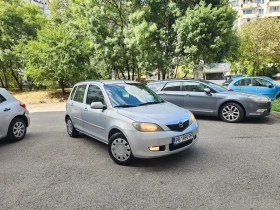 Mazda 2 1.3 ГАЗ-ИНЖ * КЛИМАТИК* !ТОП!