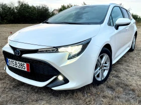 Toyota Corolla 1.8HYBRID / 11000КМ / LANE ASSIST / DISTRINIC / , снимка 1