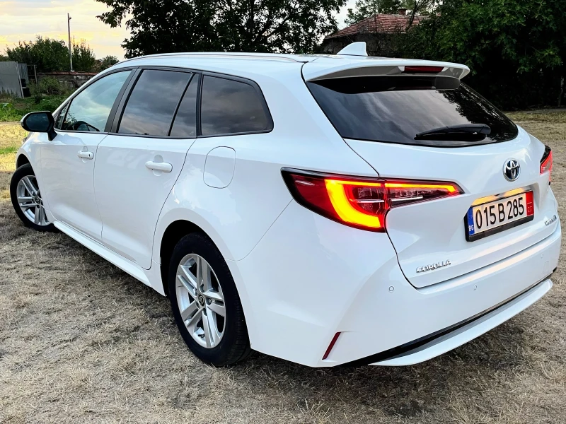 Toyota Corolla 1.8HYBRID / 11000КМ / LANE ASSIST / DISTRINIC / , снимка 2 - Автомобили и джипове - 47122481