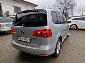 VW Touran 2.0TDI!!ШВЕЙЦАРИЯ!КОЖА!СТЪКЛЕН ТАВАН!НАВИ - 10200 € / 19949.47 лв. - 49146767 6