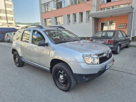 Обява за продажба на Dacia Duster 1.6 клима 127000км ~10 900 лв. - изображение 2