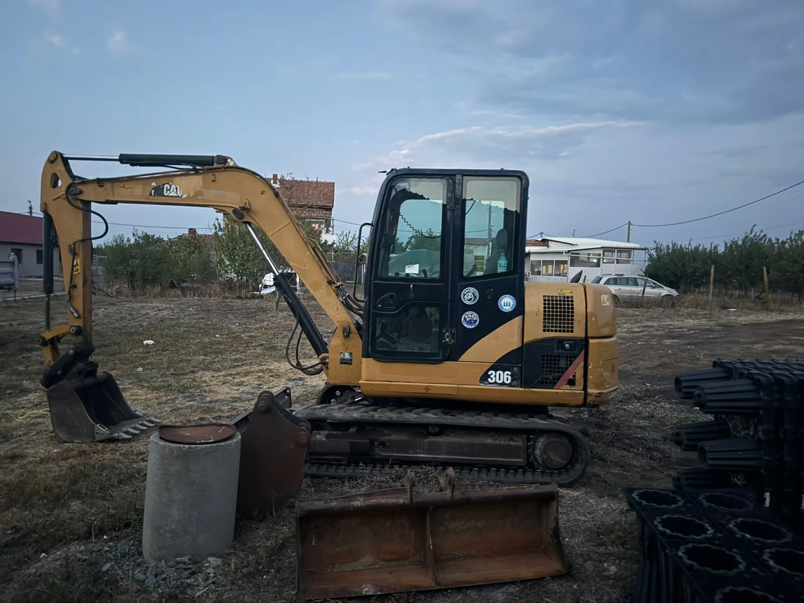 Багер Cat 306