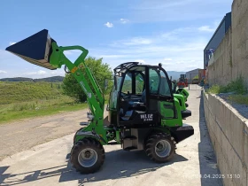 Мини челни товарачи Komatsu МАМУТ X -TRA, снимка 1