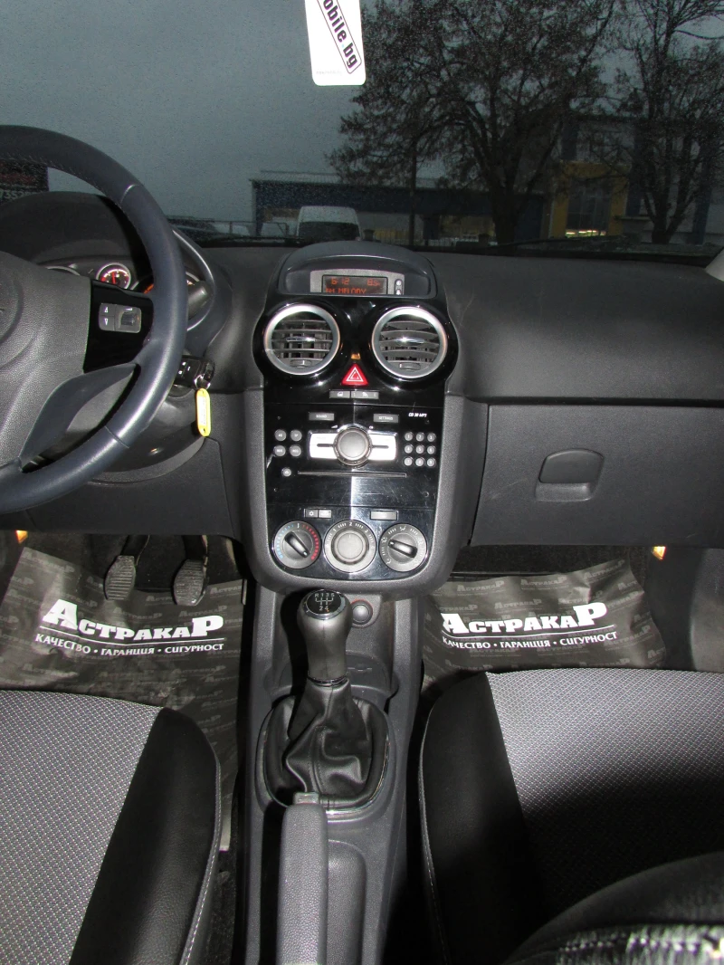Opel Corsa 1.2i EURO4, снимка 12 - Автомобили и джипове - 52859250