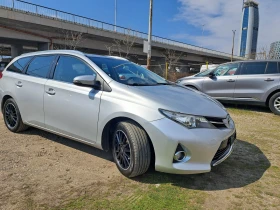 Toyota Auris 1.6i , снимка 1