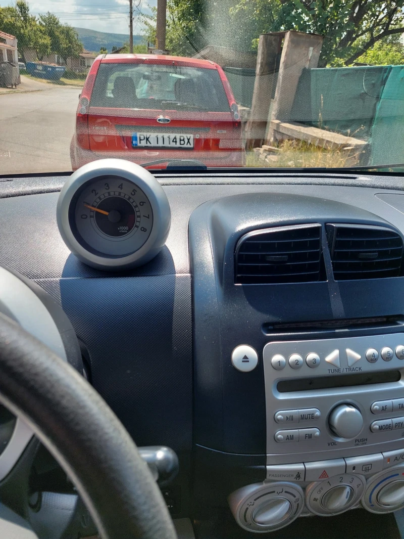 Daihatsu Sirion 1.3i, снимка 8 - Автомобили и джипове - 51044299