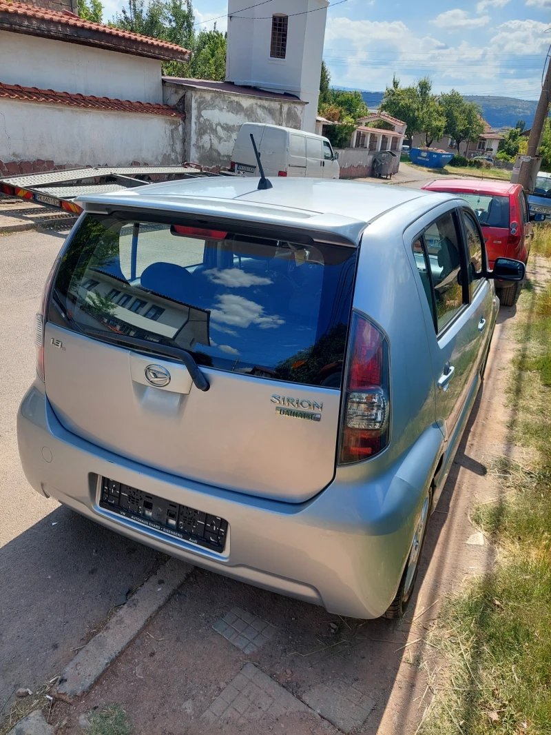 Daihatsu Sirion 1.3i, снимка 11 - Автомобили и джипове - 51044299