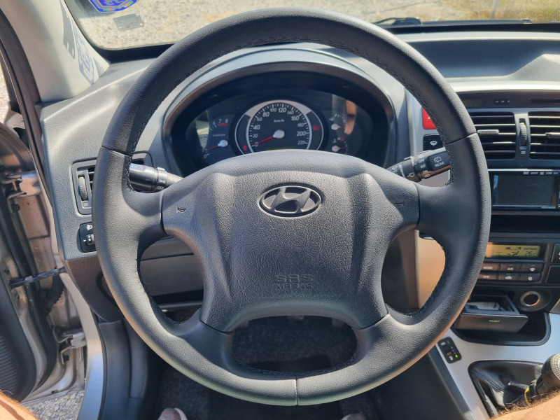 Hyundai Tucson 2.0i  Газ инж. 4х4, снимка 7 - Автомобили и джипове - 46459844