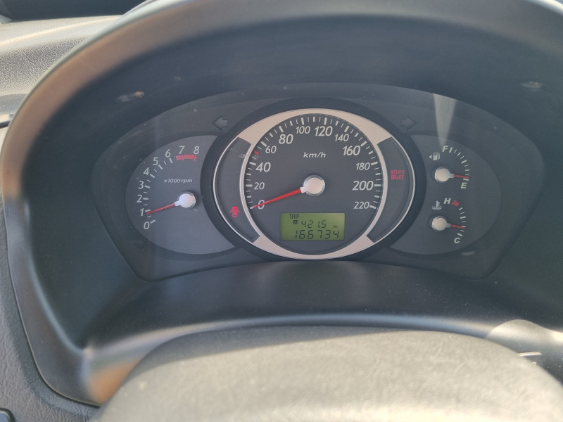 Hyundai Tucson 2.0i  Газ инж. 4х4, снимка 11 - Автомобили и джипове - 46459844