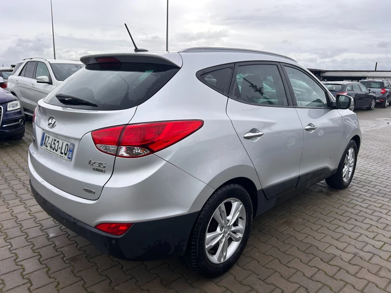 Hyundai IX35 2.0CRDI 4WD PANORAMA/KOJA/NAVI EURO 5, снимка 6 - Автомобили и джипове - 52376628