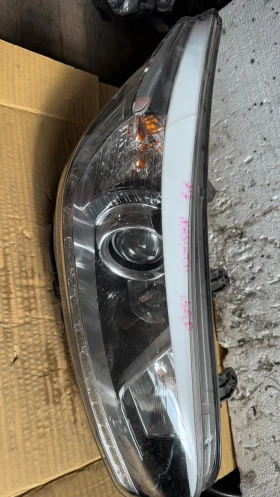       a Kia Ceed - 92102-A2220 (  ) 