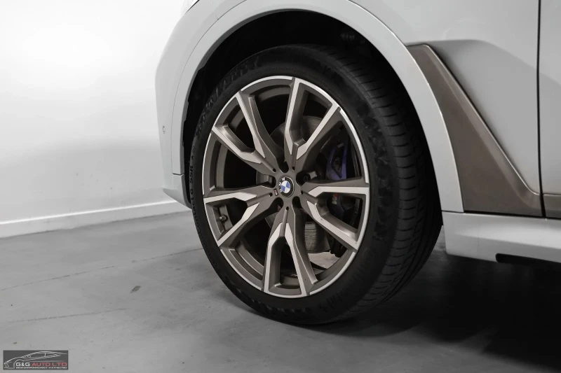 BMW X7 M50D/4X4/7S/400HP/PANO/360/LASER/ACC/MASSAGE/890f, снимка 4 - Автомобили и джипове - 52237296
