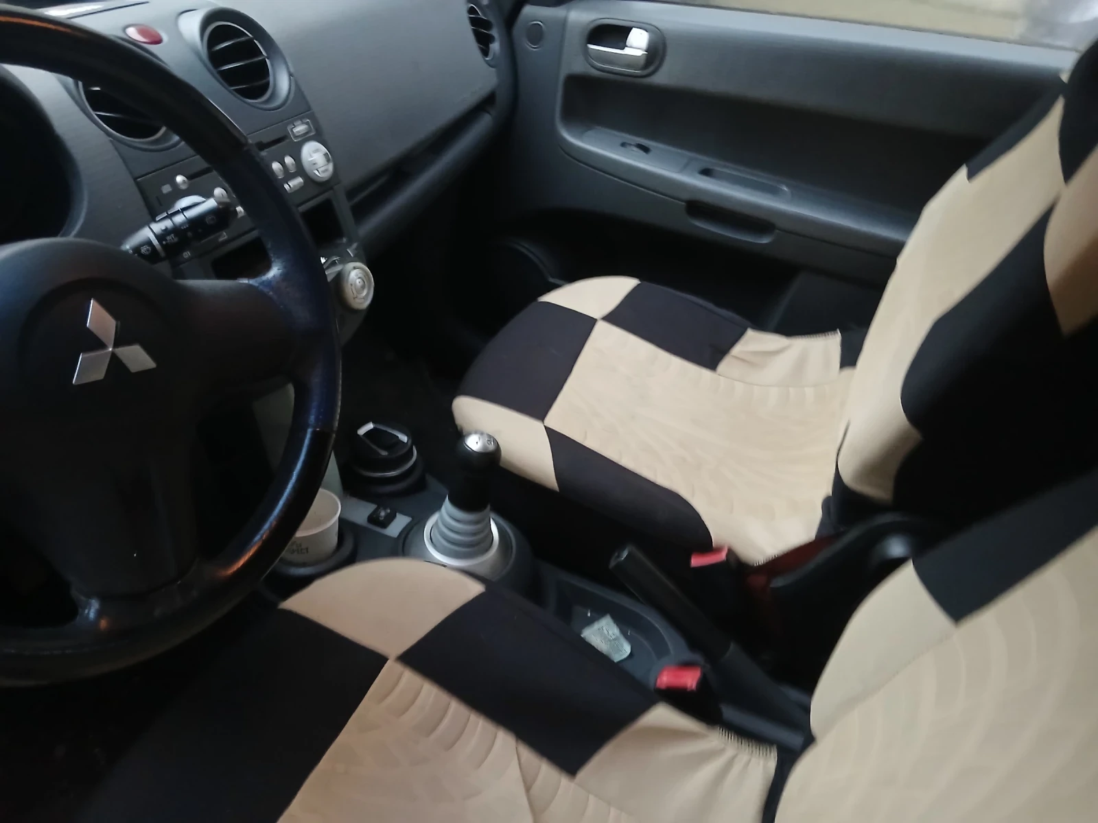 Mitsubishi Colt  - изображение 7