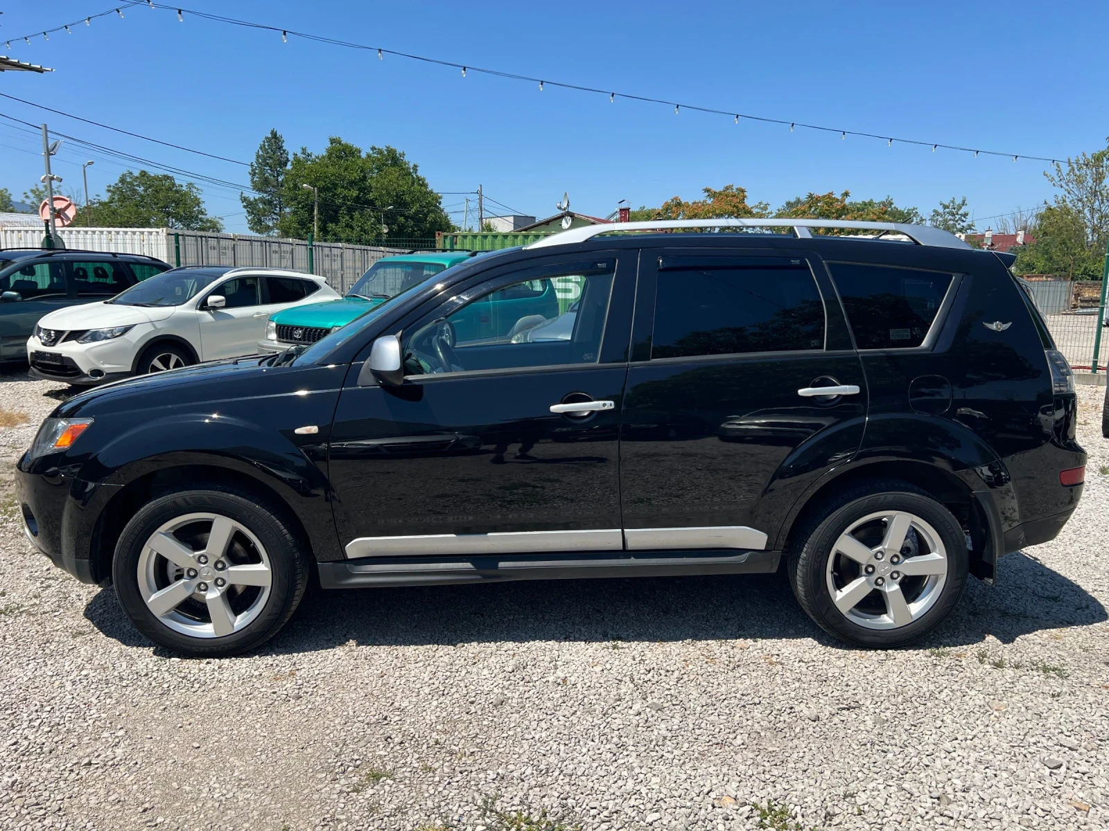 Mitsubishi Outlander 2.4* ГАЗОВА УРЕДБА* АВТОМАТИК* КОЖА* НАВИ* КАМЕРА*, снимка 8 - Автомобили и джипове - 55503028