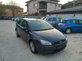 Ford Focus 1.4i 80кс климатик - [1] 