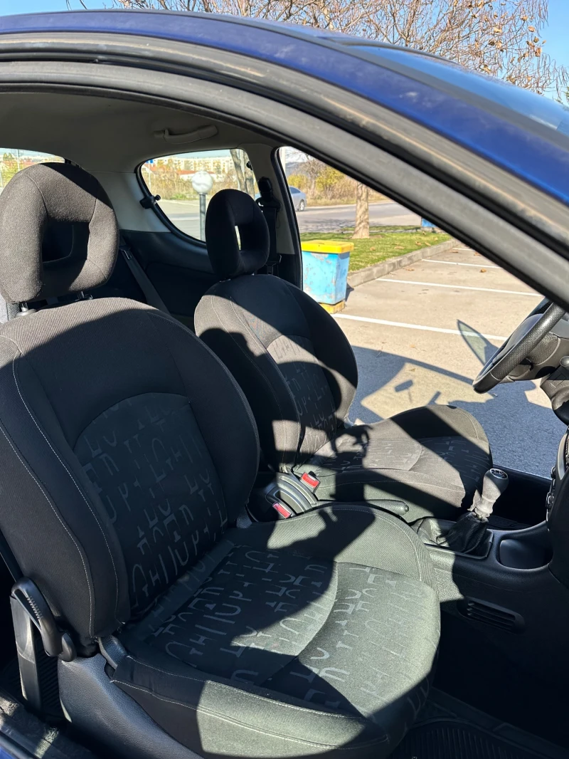 Peugeot 206, снимка 13 - Автомобили и джипове - 52444564