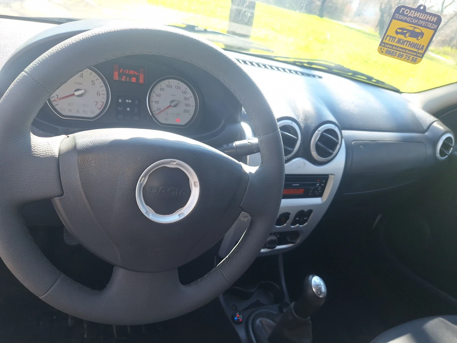 Dacia Logan 1.6 7 места, снимка 10 - Автомобили и джипове - 53829547