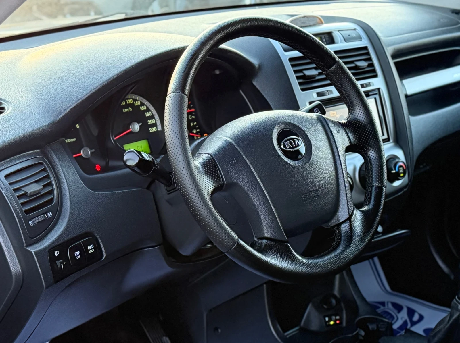 Kia Sportage 2.0i * 4WD * GAZ , снимка 13 - Автомобили и джипове - 54569337