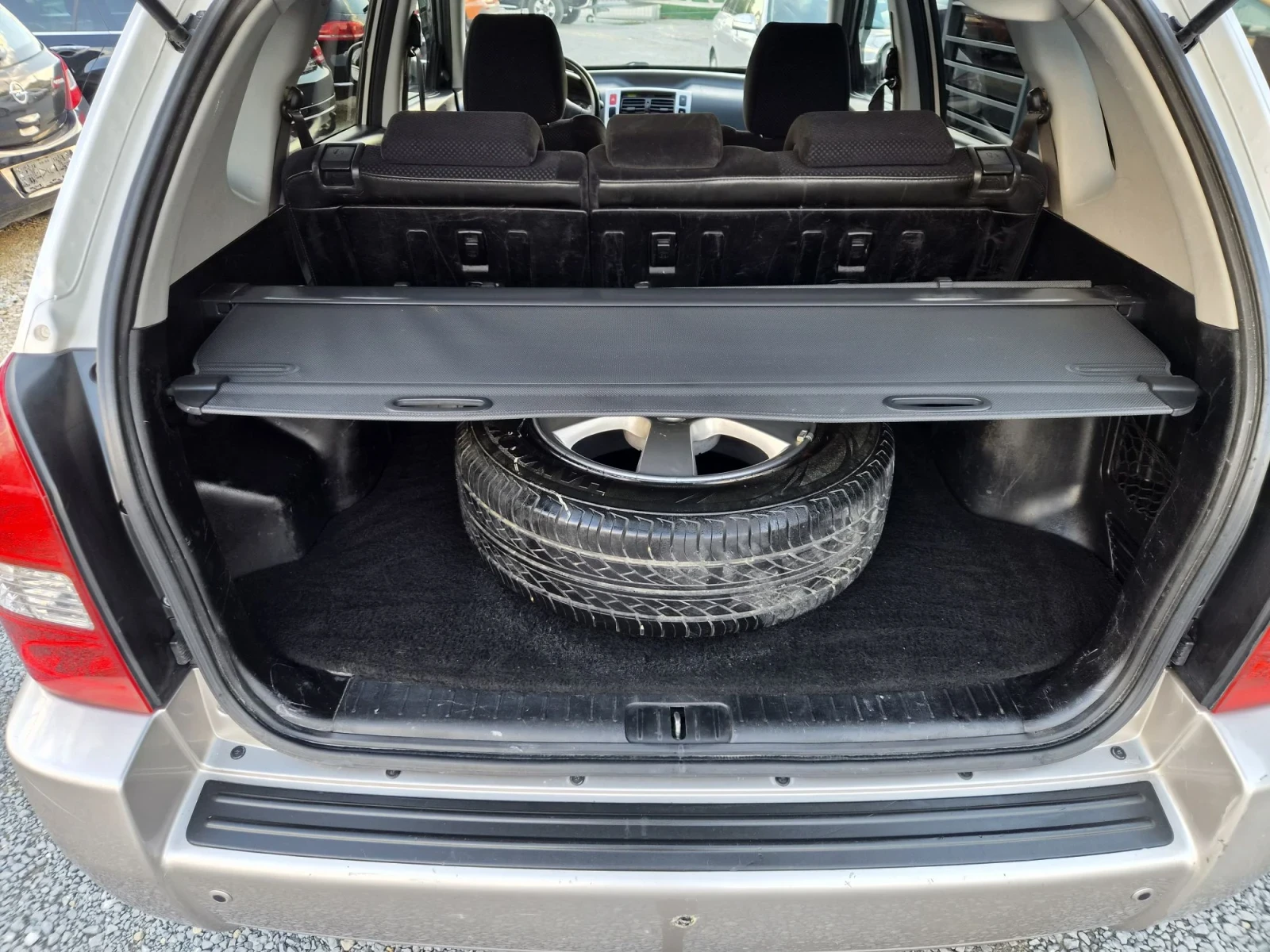 Hyundai Tucson 2.0 LPG 4X4, снимка 12 - Автомобили и джипове - 55901374