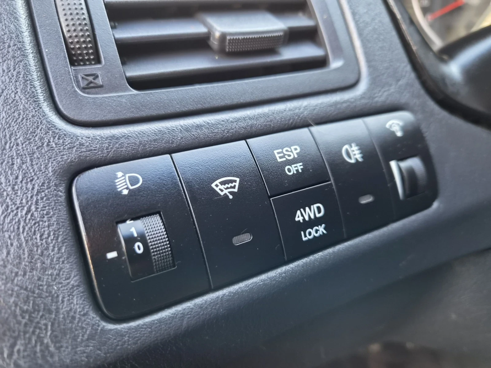 Hyundai Tucson 2.0 LPG 4X4, снимка 15 - Автомобили и джипове - 55901374