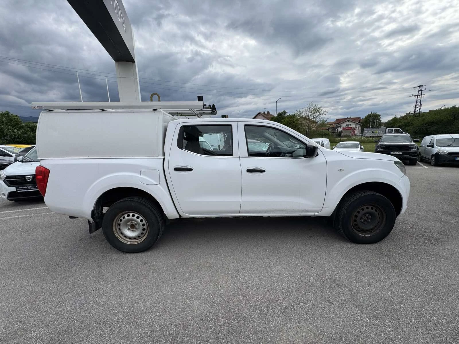 Nissan Navara 2.3 Dci, снимка 7 - Автомобили и джипове - 54640770