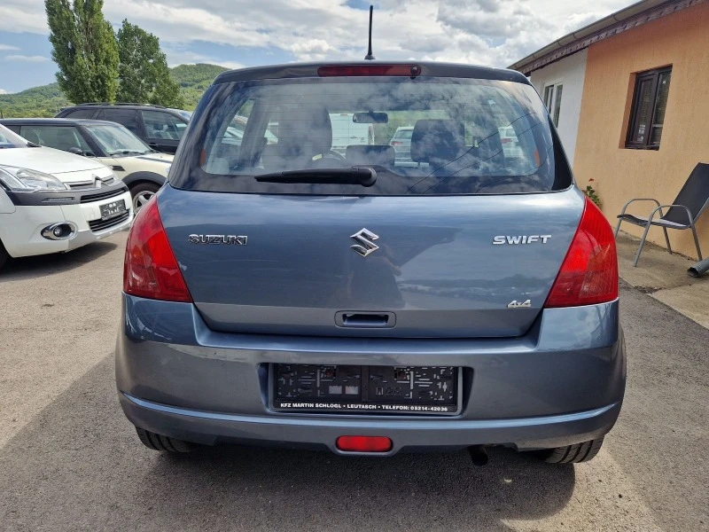 Suzuki Swift 1.3, снимка 7 - Автомобили и джипове - 46764574