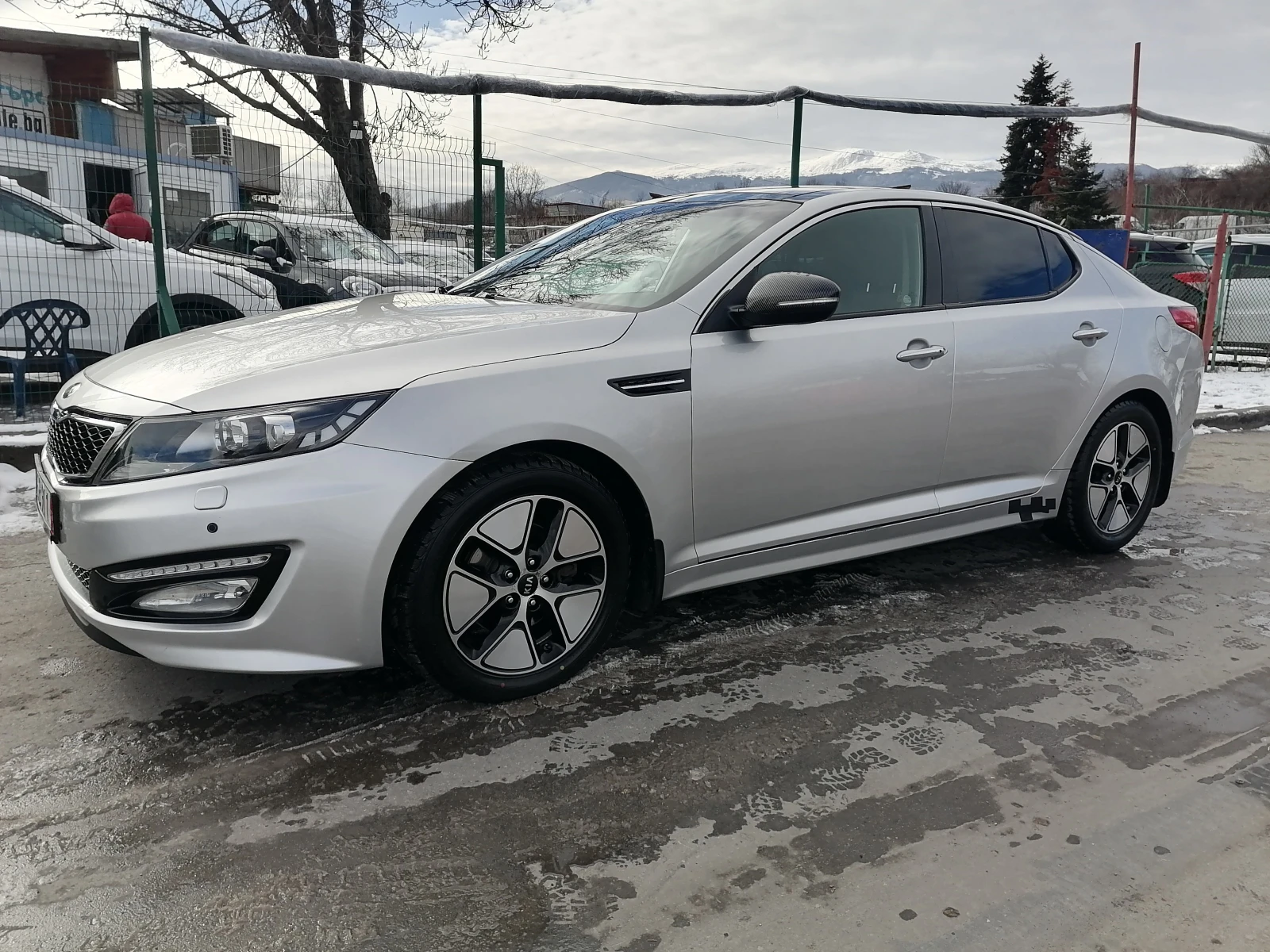 Kia Optima 2.0i Hibrid - изображение 8