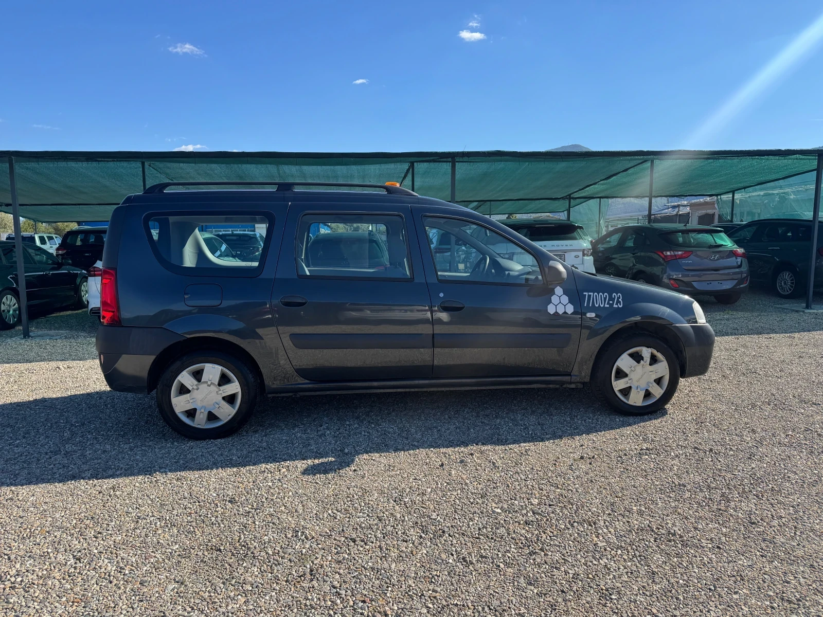 Dacia Logan 1.6 GPL, снимка 7 - Автомобили и джипове - 56081526
