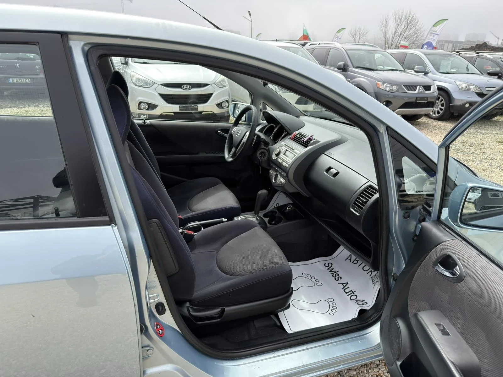 Honda Jazz 1.4i Automat, снимка 11 - Автомобили и джипове - 54081948