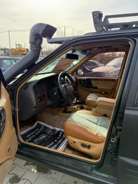 Jeep Grand cherokee 5.2* Нов внос* RAPTOR боя* Перфектна кутия* Фейс* , снимка 12