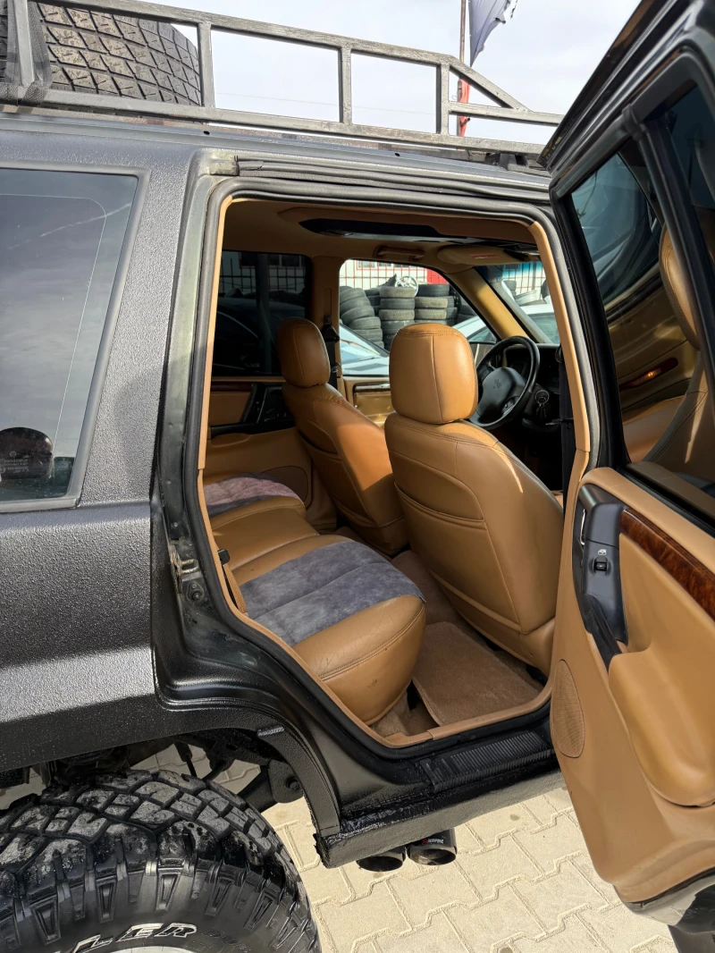 Jeep Grand cherokee 5.2* Нов внос* RAPTOR боя* Перфектна кутия* Фейс* , снимка 7 - Автомобили и джипове - 49485120