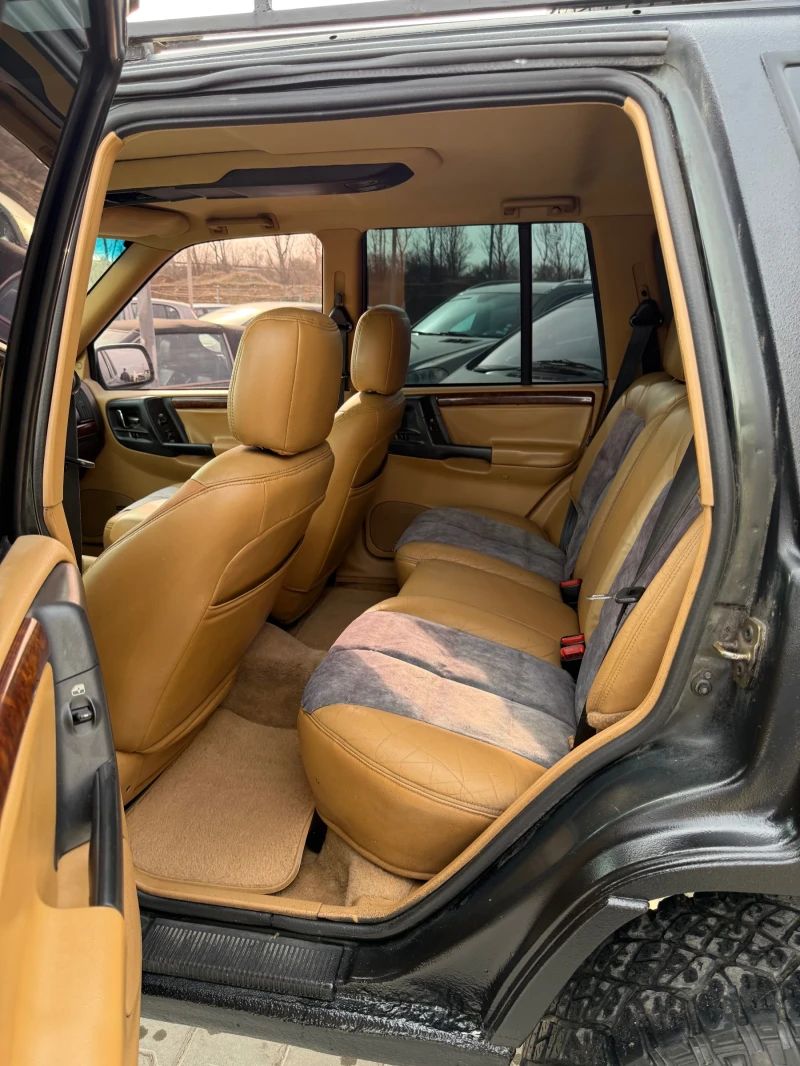 Jeep Grand cherokee 5.2* Нов внос* RAPTOR боя* Перфектна кутия* Фейс* , снимка 11 - Автомобили и джипове - 49485120