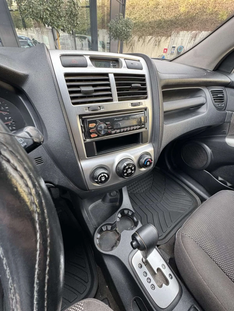 Kia Sportage CRDi 4WD, снимка 15 - Автомобили и джипове - 48906941