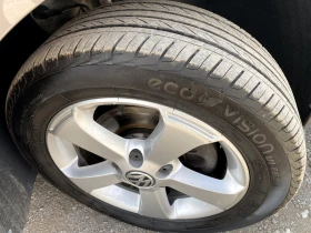 VW Touran 1.6TDI HighLine---Бонбон--- - 11490 лв. - 61300637 | Car24.bg