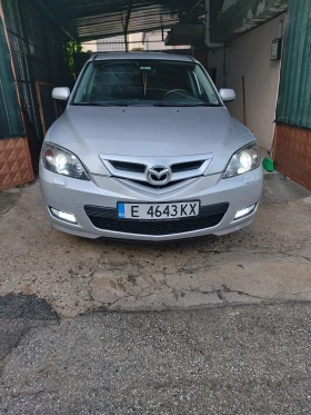 ������ Mazda 3