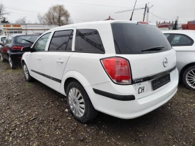 Opel Astra 1.9 Turbo  6 скорости , снимка 3