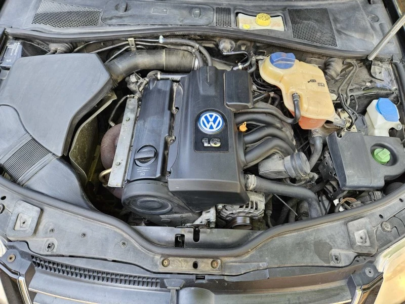 VW Passat 1.6 i, снимка 12 - Автомобили и джипове - 46788542