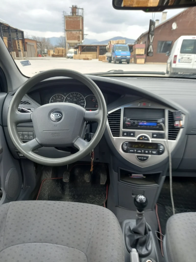 Kia Carens, снимка 8 - Автомобили и джипове - 49375570