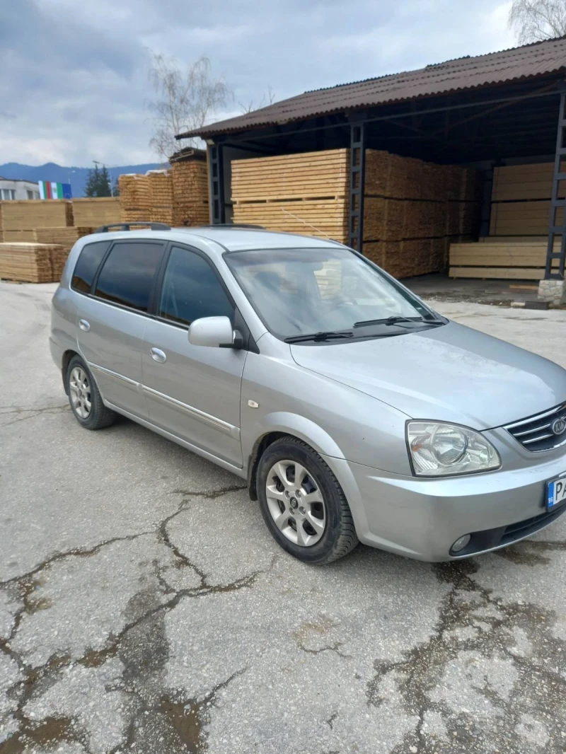 Kia Carens, снимка 12 - Автомобили и джипове - 49375570