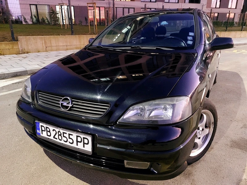 Opel Astra 1.6, снимка 11 - Автомобили и джипове - 52756235