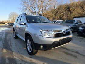 Dacia Duster 1.6i 110к.с фабрична газ , снимка 2