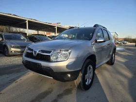 Dacia Duster 1.6i 110к.с фабрична газ , снимка 1