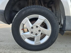 Dacia Duster 1.6i 110к.с фабрична газ , снимка 9