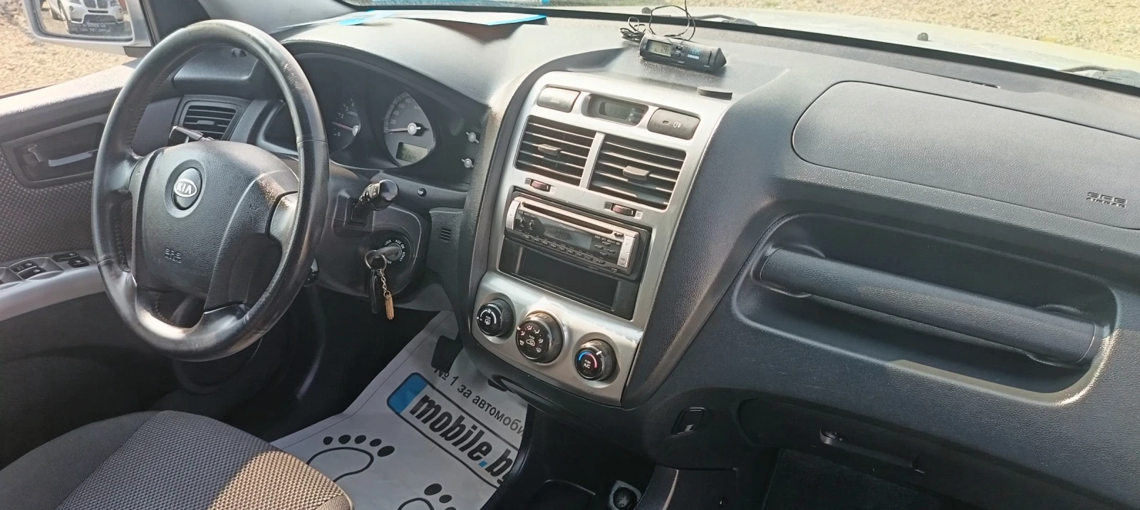 Kia Sportage 2.0/115 * Обслужен * , снимка 11 - Автомобили и джипове - 53738089