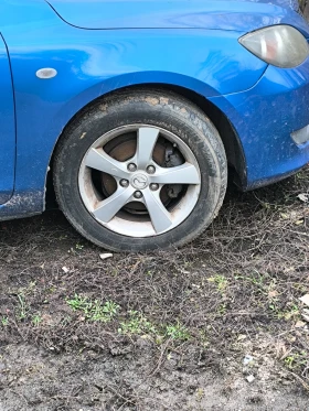 Mazda 3, снимка 1