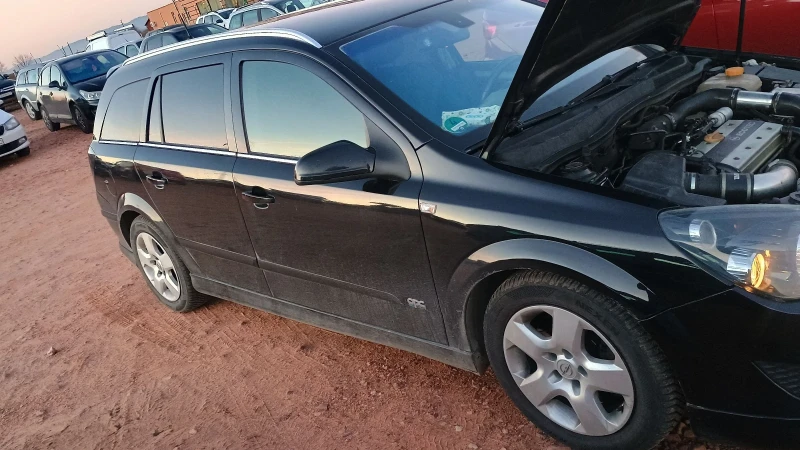 Opel Astra 2.0T, снимка 5 - Автомобили и джипове - 48122714