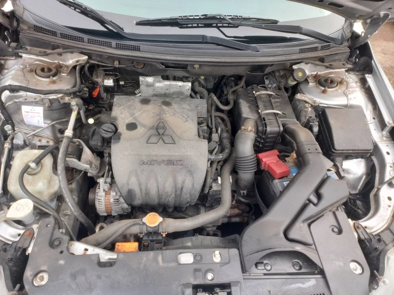 Mitsubishi Lancer 1.5 , снимка 11 - Автомобили и джипове - 53263292